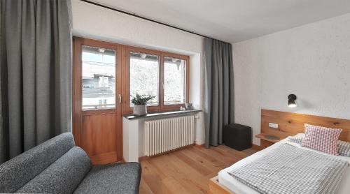 Letto o letti in una camera di Goldvogel Apartments