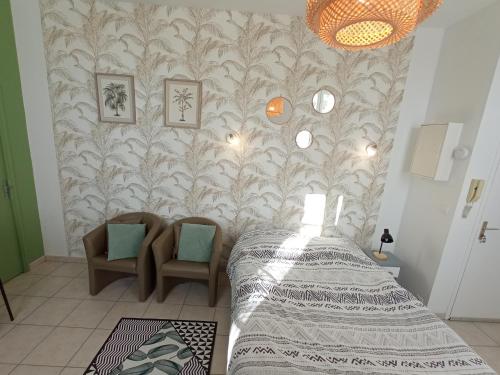 Postel nebo postele na pokoji v ubytování Lumineux appartement en RDC près port de plaisance