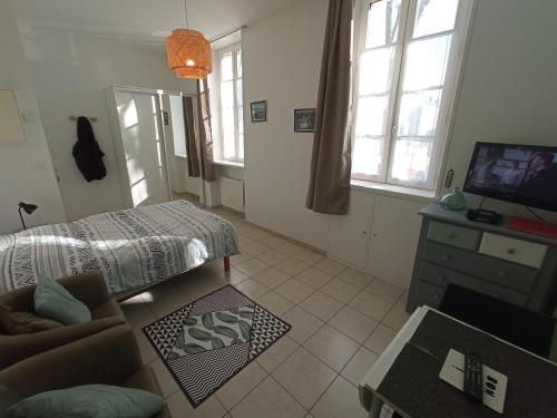 Postel nebo postele na pokoji v ubytování Lumineux appartement en RDC près port de plaisance