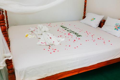 Postel nebo postele na pokoji v ubytování Beach Lagoon Guesthouse
