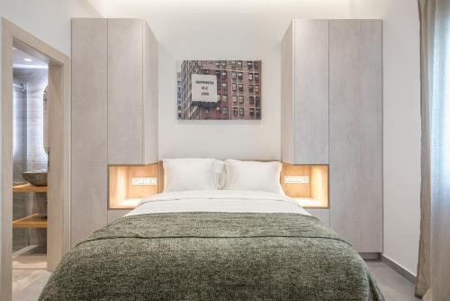 a bedroom with a large bed in a room at Newly Renovated Escape/Psychiko in Athens