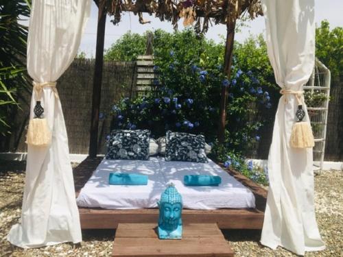 เตียงในห้องที่ Finca del Gecko