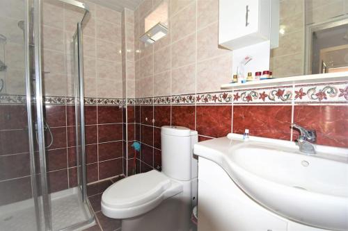 Koupelna v ubytování Villa HUZUR