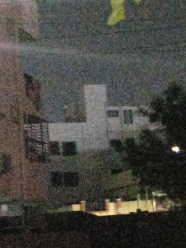 a view of a building at night at Anantha in Secunderabad