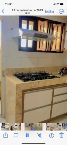 ein Bild von einem Kochfeld in einer Küche in der Unterkunft Casa da Tati in Cayru