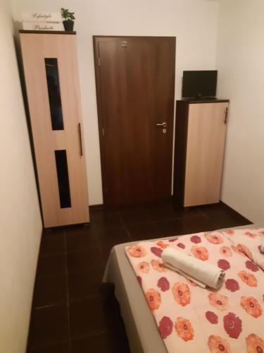 Postel nebo postele na pokoji v ubytování Apartment Pharamis
