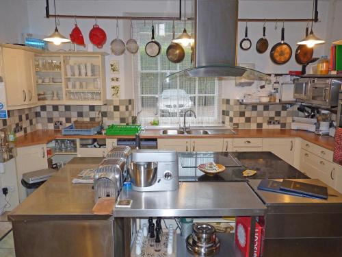 a kitchen with a sink and a counter top at Town Mills in Dulverton