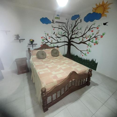 Tempat tidur dalam kamar di Temporario LEK