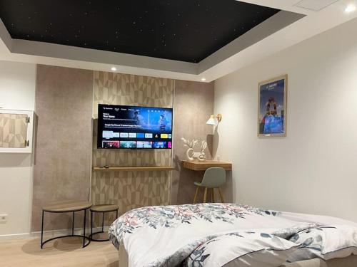 Llit o llits en una habitació de Studio ciel étoilé