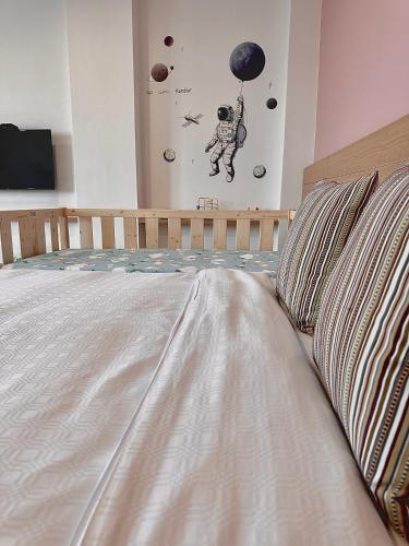 Postel nebo postele na pokoji v ubytování Qing Taoyuan Homestay