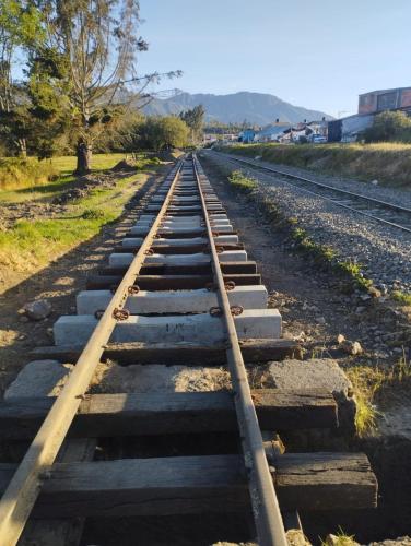 a set of train tracks on the ground at Hotel FLORA Suesca in Suesca