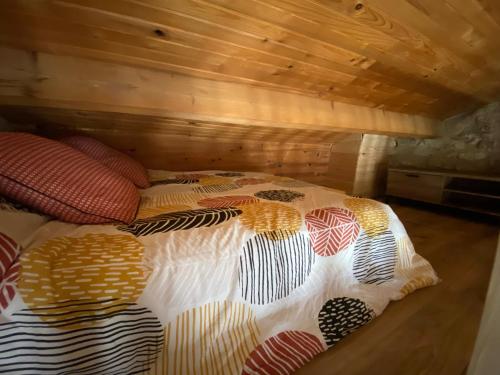 En eller flere senge i et værelse på MAISON DE CAMPAGNE à GIgnac