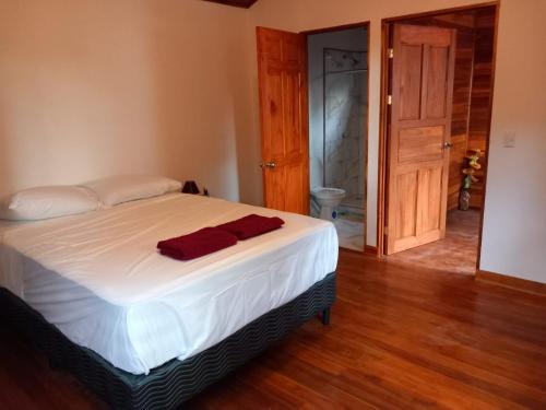 Postel nebo postele na pokoji v ubytování Aura Bungalow