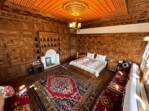 an aerial view of a bedroom with a bed and a fireplace at Leyla Hanım Konağı in Safranbolu