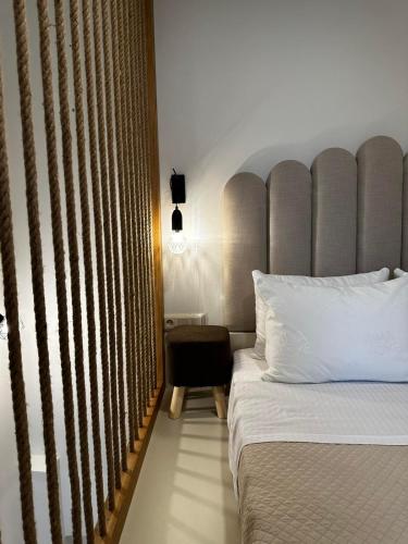 Säng eller sängar i ett rum på Mentha Luxury Home