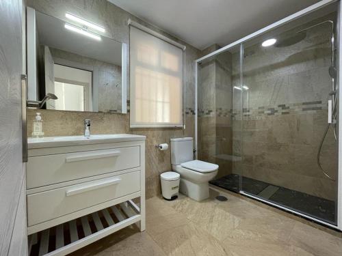 Et badeværelse på Apartamento El Portil, Pinares