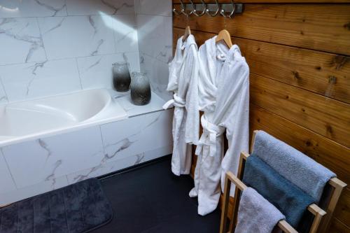 Koupelna v ubytování Chambres et table d'hôtes au chalet Datcha
