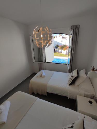 A bed or beds in a room at Residencial los Pinos 3