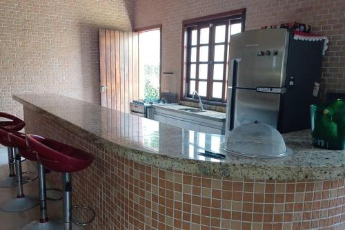 Köök või kööginurk majutusasutuses Casa de Praia Barra Seca Pé na Areia