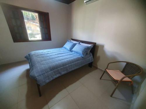 Voodi või voodid majutusasutuse Casa de Praia Barra Seca Pé na Areia toas