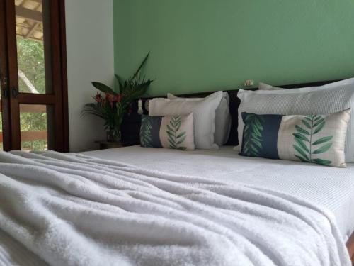 Łóżko lub łóżka w pokoju w obiekcie Pousada Maliale Boipeba