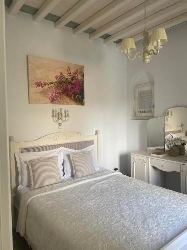 Katil atau katil-katil dalam bilik di Geronti Moscha Apartment
