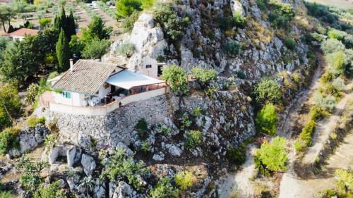 an aerial view of a house on a mountain at B&B Tenuta La Puntara in Caltanissetta