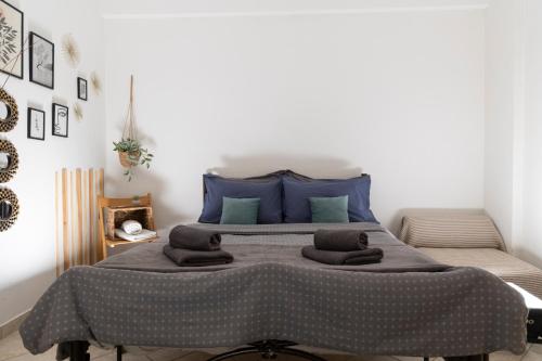En eller flere senge i et værelse på Evaggelia's Apartments 2 Διαμονή σαν το σπίτι σας