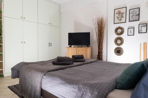 Posteľ alebo postele v izbe v ubytovaní Evaggelia's Apartments 2 Διαμονή σαν το σπίτι σας