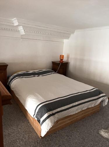 Katil atau katil-katil dalam bilik di Appartement typique Lillois