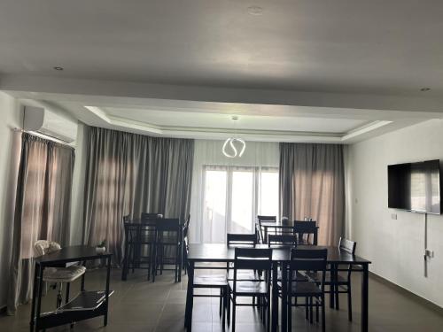 a dining room with a table and chairs at Epic Springs Bed & Breakfast in Jwaneng
