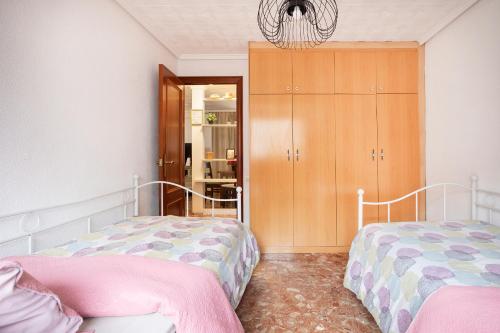Posteľ alebo postele v izbe v ubytovaní Big apartment at beach with terrace