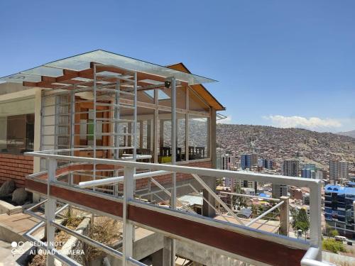 a house under construction with a view of the city at Villa Florita in La Paz