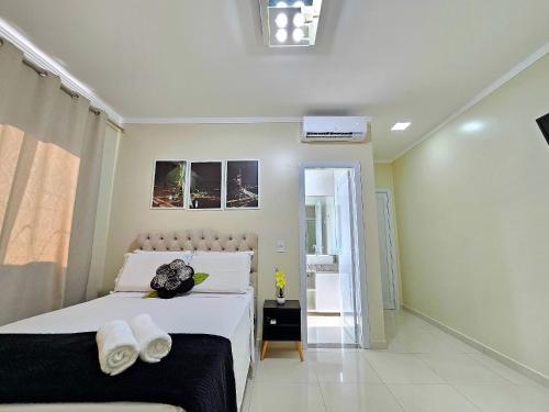 Ένα ή περισσότερα κρεβάτια σε δωμάτιο στο Casa 2 quartos Jacuzzi aquecida prox Cataratas