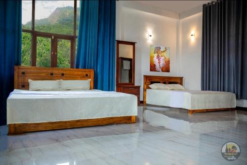 Ένα ή περισσότερα κρεβάτια σε δωμάτιο στο The Papa Resort Ambuluwawa