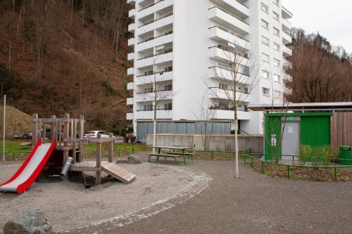 a park with a playground with a slide at Wohlfühlapartment 24 in Götzis