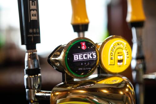 a close up of a bottle of beer at Marine Hotel in Paignton
