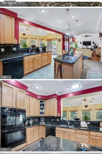 a kitchen with wooden cabinets and black counter tops at PEACE HOME(EVENTS ALLOWED) in Hughesville