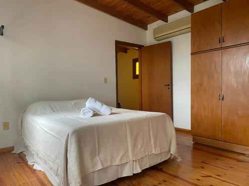 Giường trong phòng chung tại Tranquilidad en Bragado