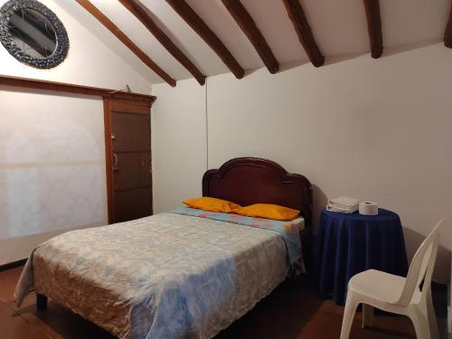 Ένα ή περισσότερα κρεβάτια σε δωμάτιο στο Casona la Vega