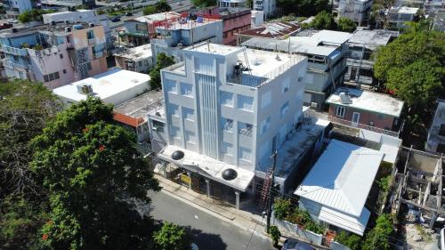 an overhead view of a building in a city at Economical Near Beach with Full bed 4th floor in San Juan