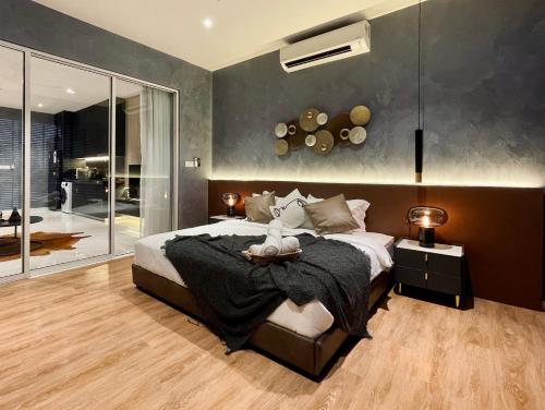 a bedroom with a large bed in a room at Designer Suite Quill Residence by Hausome in Kuala Lumpur