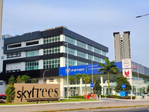 a large building with a sign in front of it at Skytree A0902-(1) in Foodie City in Johor Bahru