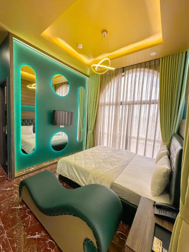 a bedroom with a large bed in a room at Tuyet Suong Hotel in Quang Ngai