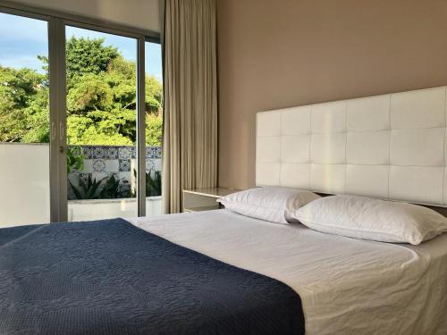 מיטה או מיטות בחדר ב-Penthouse with private pool & amazing views