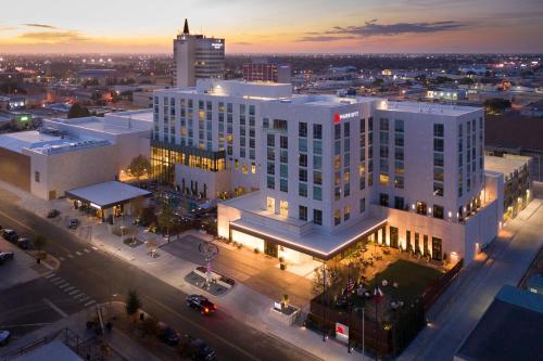 an overhead view of a large white building with a street at Odessa Marriott Hotel & Conference Center in Odessa