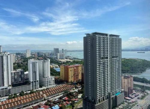 an aerial view of a city with tall buildings at Urban Suites, Best Seaview and Cityview in Town in Jelutong