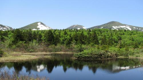 a view of a lake with mountains in the background at Toyoko Inn Aomori Ekimae in Aomori