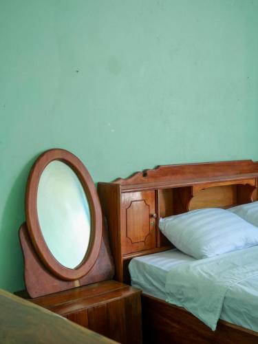 Ένα ή περισσότερα κρεβάτια σε δωμάτιο στο KFG Guesthouse