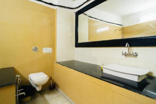 a bathroom with a sink and a toilet at Moustache Jaisalmer in Jaisalmer
